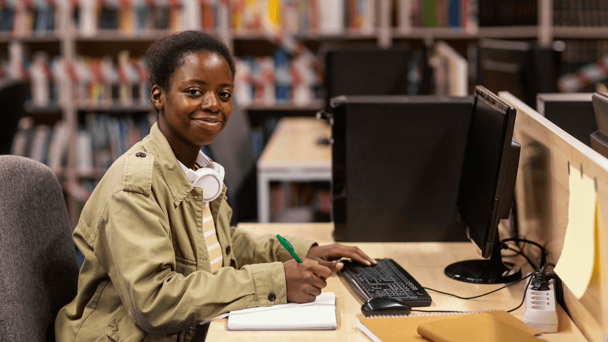 TechFasta student learning in modern library